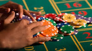 Betting interface Betting controls and account balance display during BandarQ round